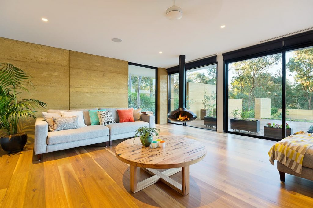 architecturally designed home utilising internal rammed earth walls