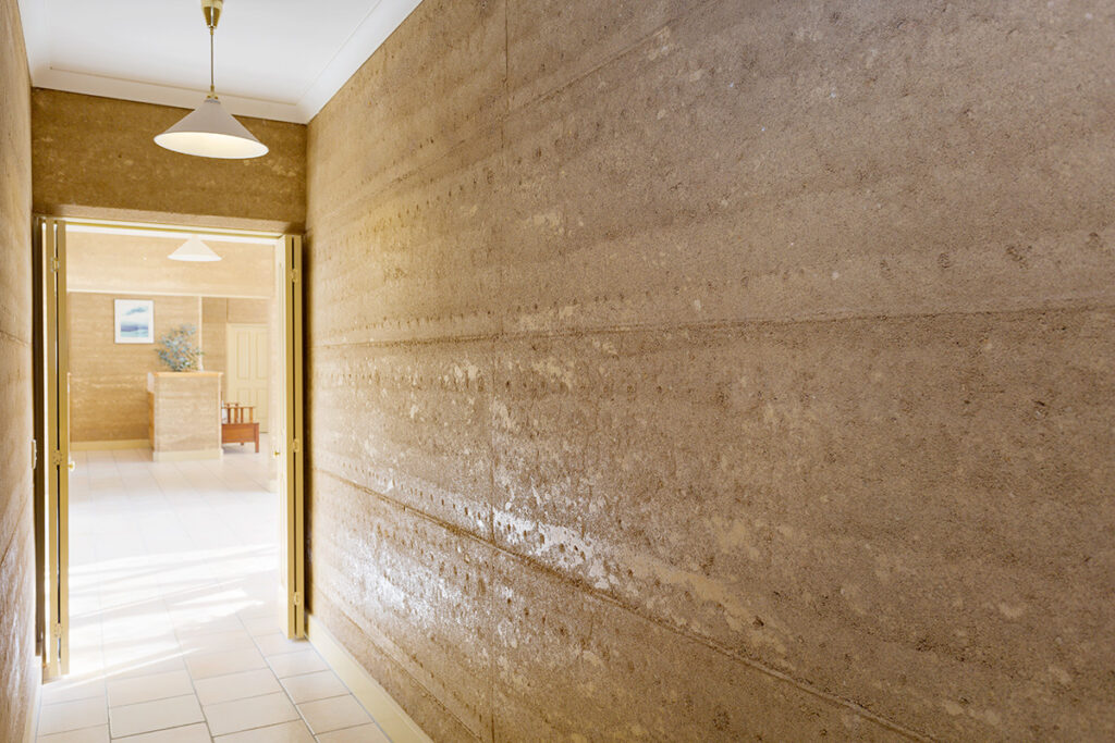 internal-rammed-earth-hallway