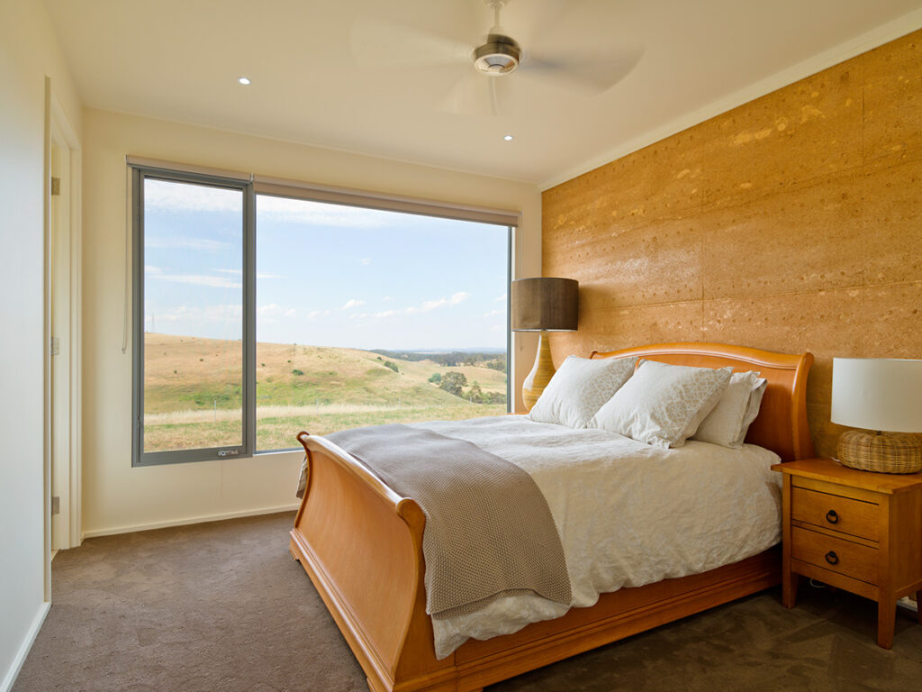 internal-rammed-earth-cosy-bedroom