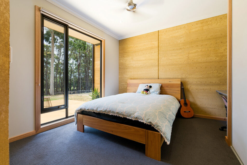 internal-rammed-earth-kids-bedroom