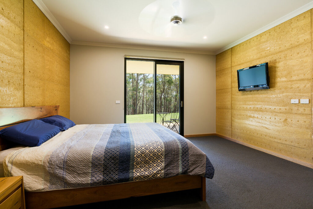 internal-rammed-earth-bedroom