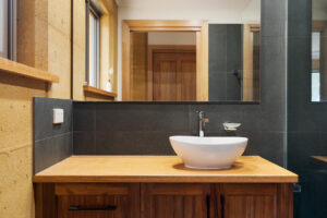 internal-rammed-earth-bathroom-wood-joinery