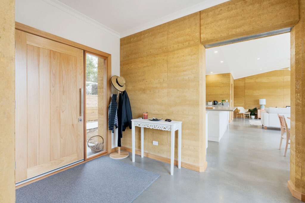 internal-rammed-earth-minimalist-entry-door