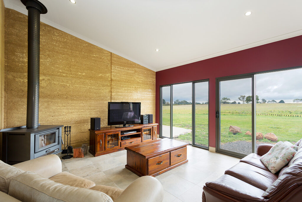 internal-rammed-earth-living-room-feature